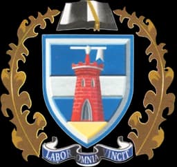 Tom Naudé High School crest